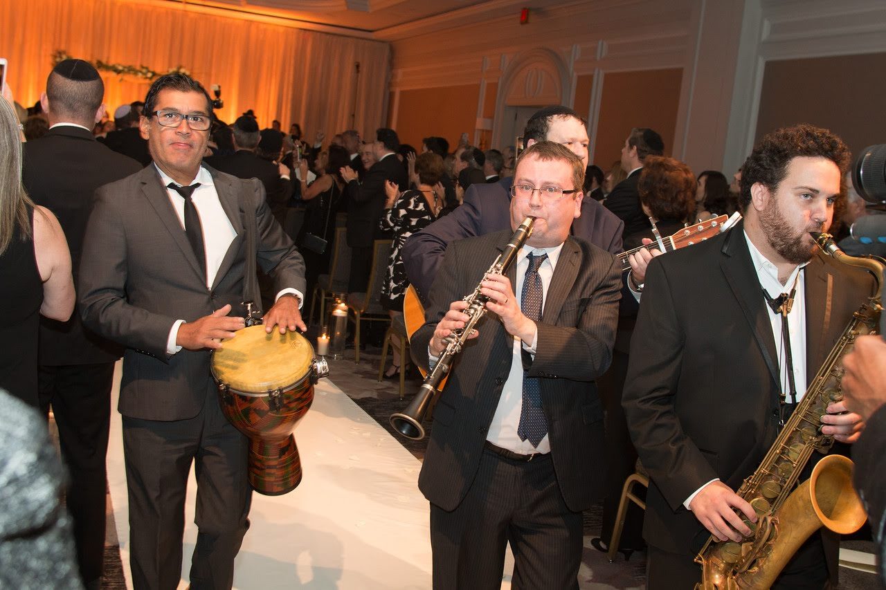 Escorting the chassan and kallah out